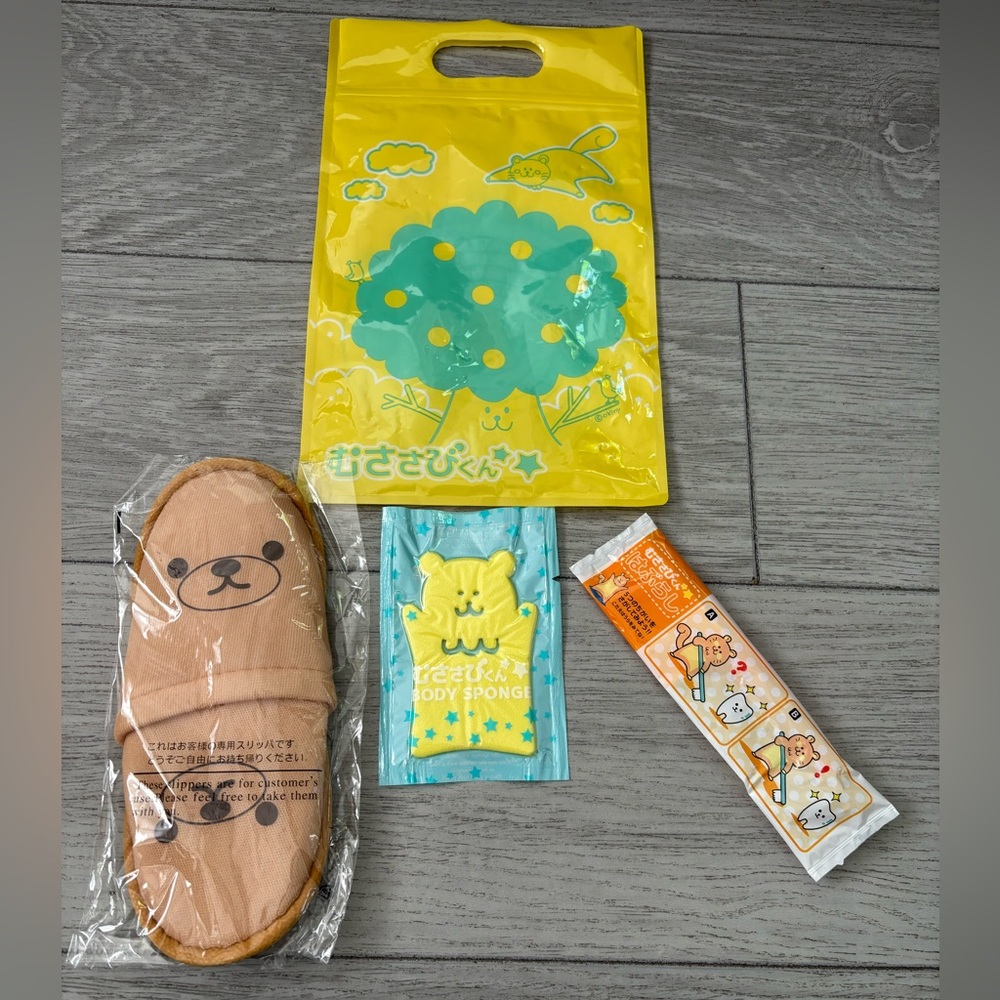 Kids’ Japanese travel toiletries in travel bag. 4 pieces, brand new and sealed.